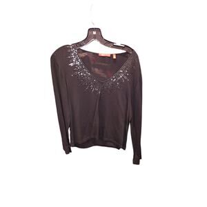 Anne Klein black knit top with sequin embellishments.